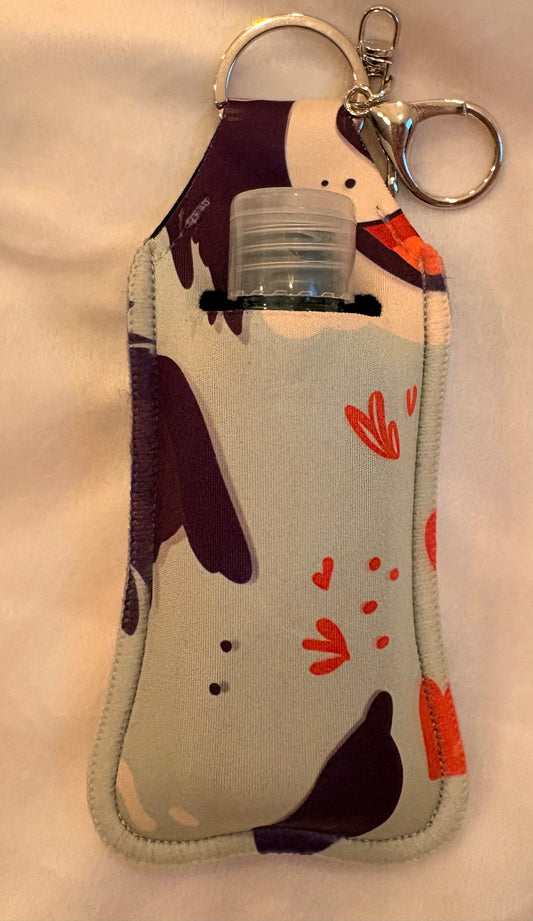 Hand sanitiser holder