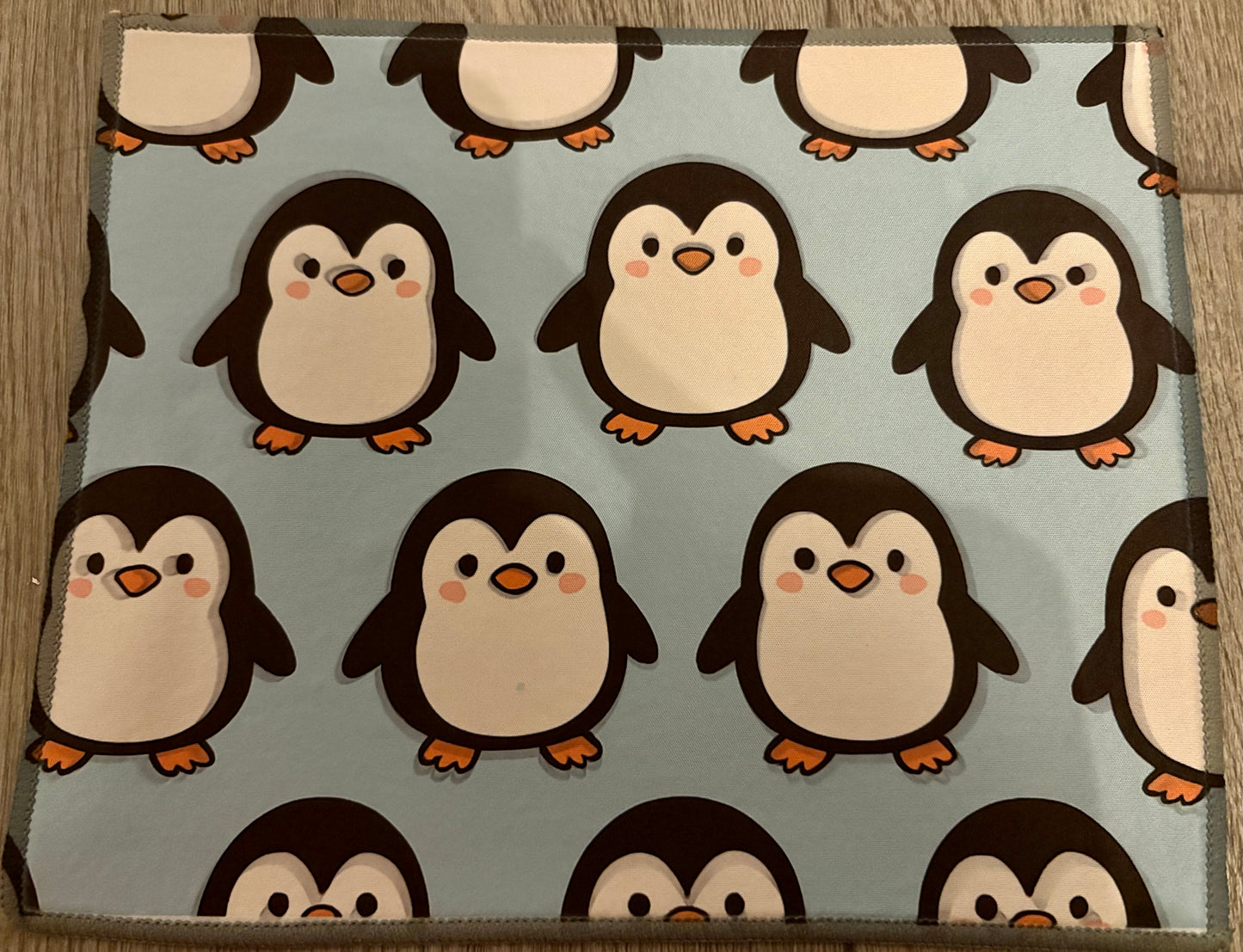 Penguin medication mat